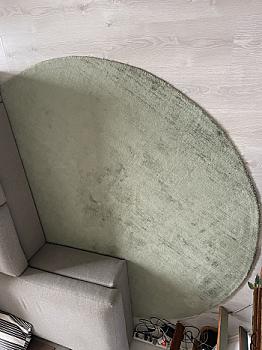 Round green rug