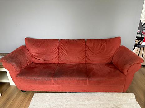 Red three-seater sofa free 